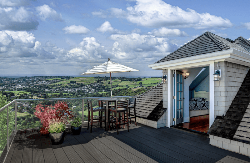 Terrace with parasol and countryside view